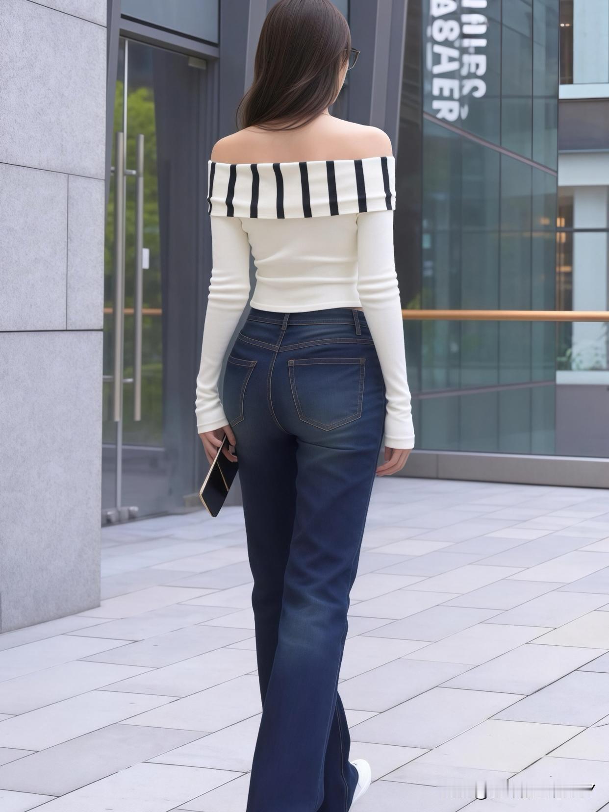 黑白条纹露肩上衣搭配牛仔裤，真是都市时尚穿搭的经典组合，简约又优雅那味儿一下就有