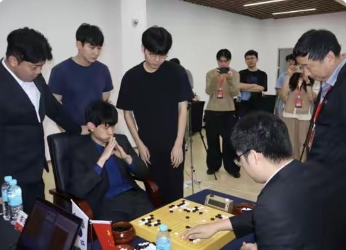 不负重望~檀啸成功扳头~芮老手到擒拿每年一度的中日韩三国围棋团体擂台赛颇