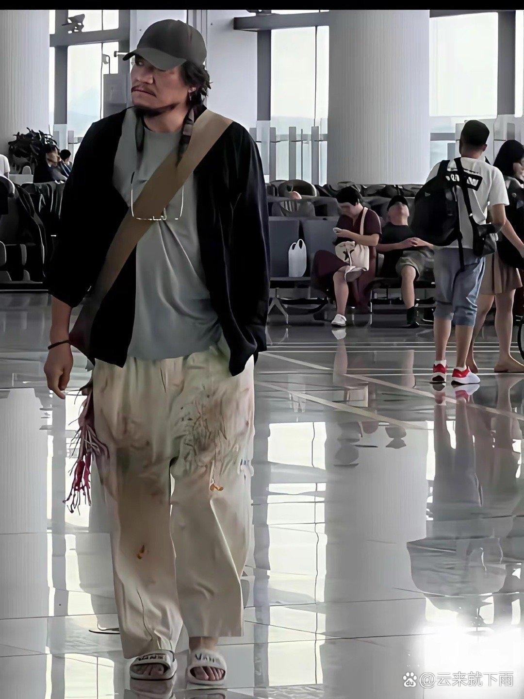 你以为他是流浪汉，其实人家穿的是巴黎世家