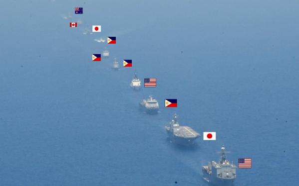 日本自卫队发布了“肩并肩”军事演习的现场照片，非常心机的将参演舰艇的国旗标注上来