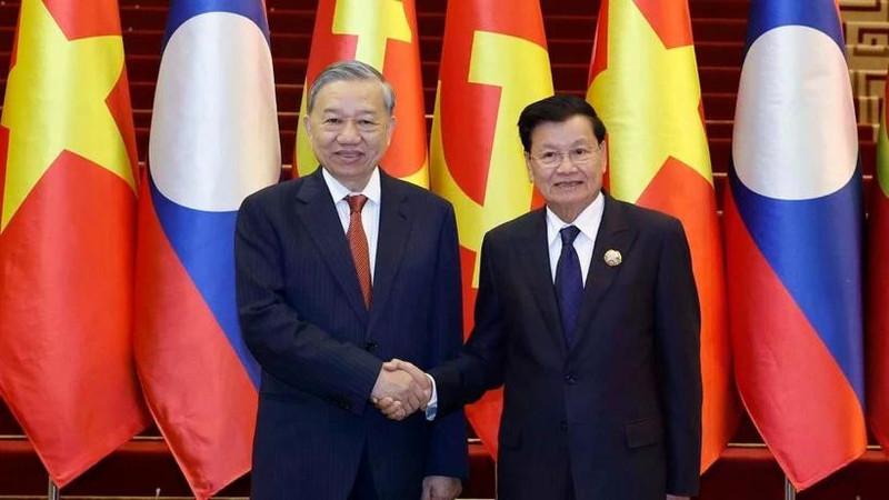 够哥们！苏林前脚当选越南一把手，老挝一把手通伦后脚就对越南进行国事访问，而且陪同