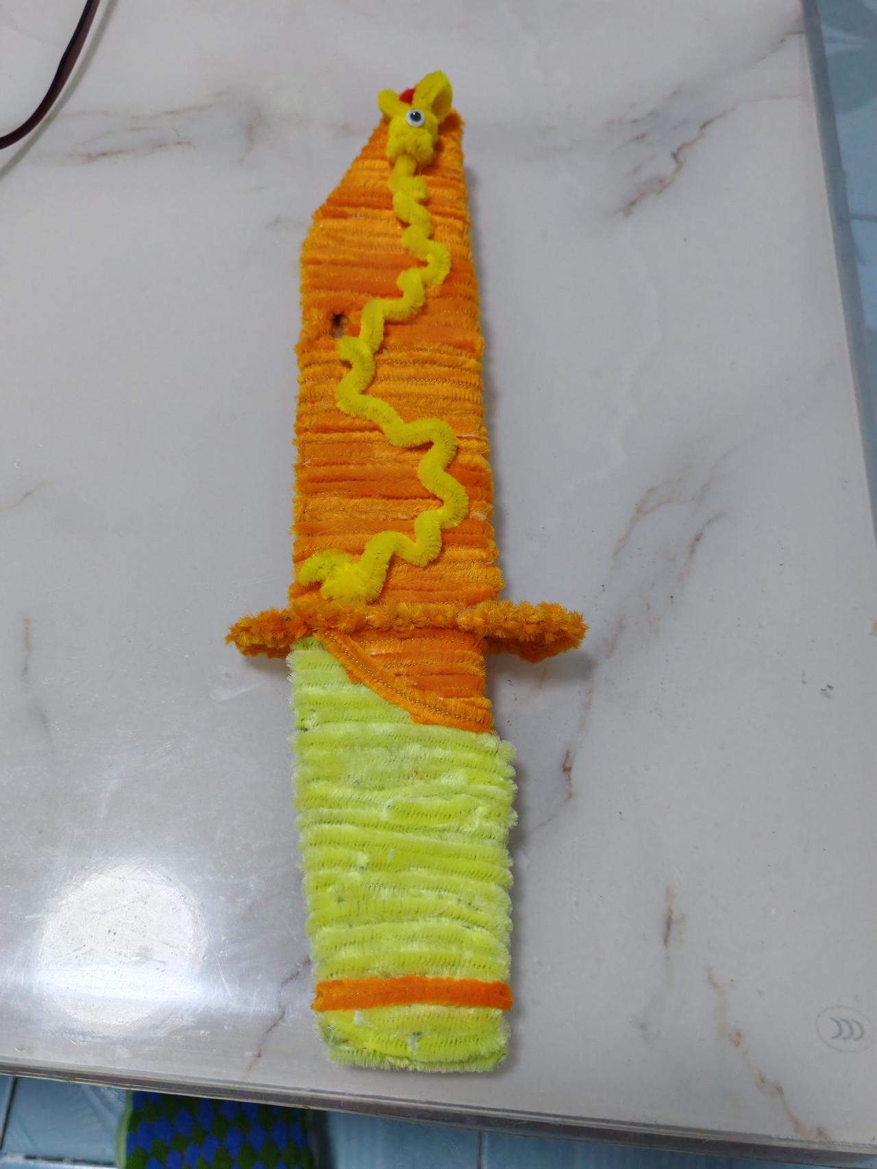 小孙子学校搞活动，办了一个跳蚤市场，把自己的东西拿到跳蚤市场去卖，让我给他做一把