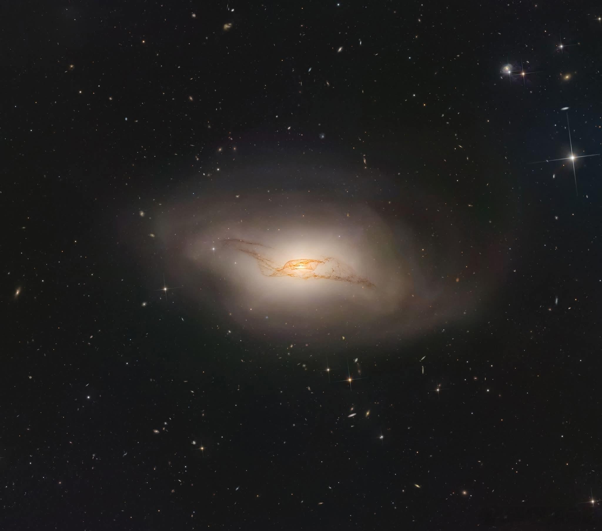 一个星系盛宴的进动遗迹——NGC4753的扭曲尘埃盘在室女座的南部，距离我们6