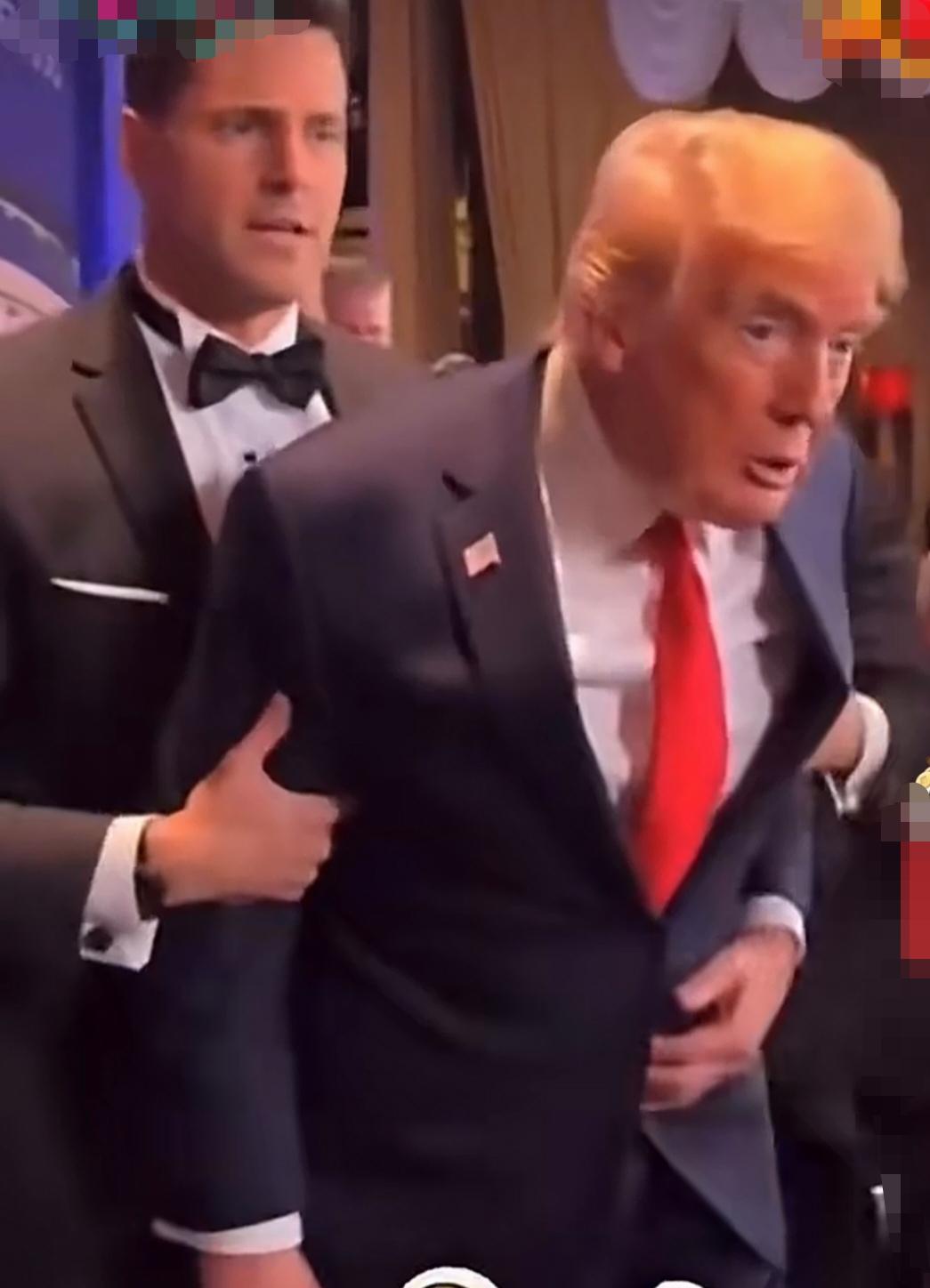 惊心动魄！这是美国总统特朗普在4月25日白宫记者协会晚宴枪击案现场的三张视频截图