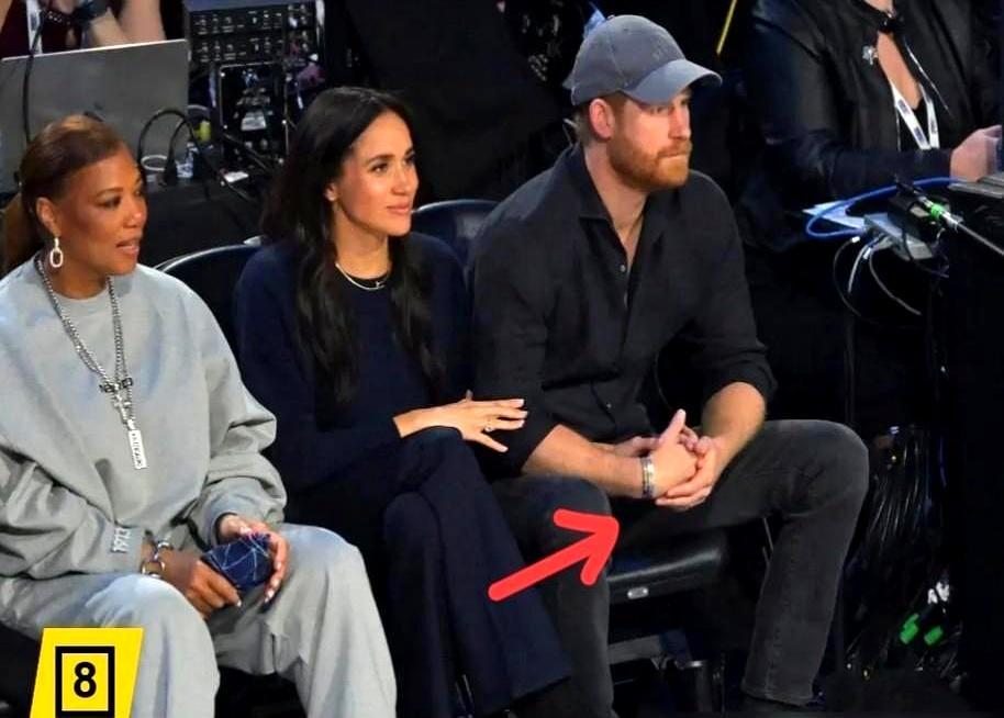 梅根当众喂哈里爆米花，他竟猛地一躲，拳头都攥紧了。你以为是秀恩爱？镜头一对