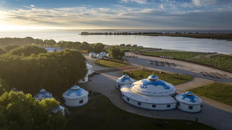 家乡的风光总是让人魂牵梦绕。庐山西海畔的易家河村，9-11月就是橘子味的仙境