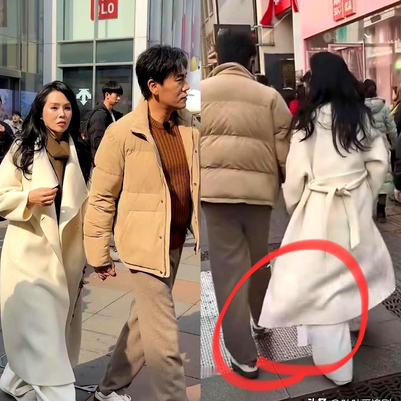 别笑伊能静大衣吊牌没剪了，这水可深着呢。大年初五，沈阳中街，秦昊把伊能静的