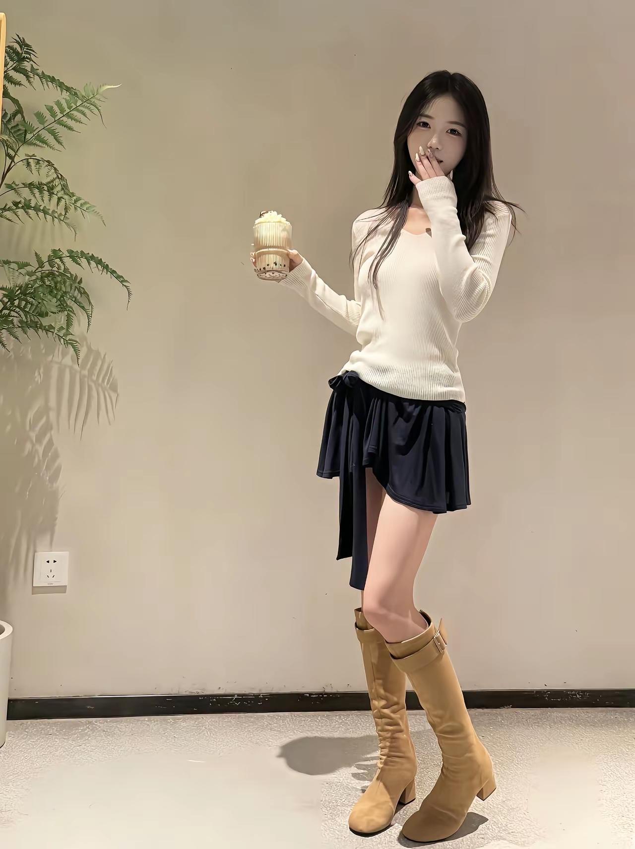 冬日暖阳下的甜美穿搭，奶茶与裙摆的完美搭配！