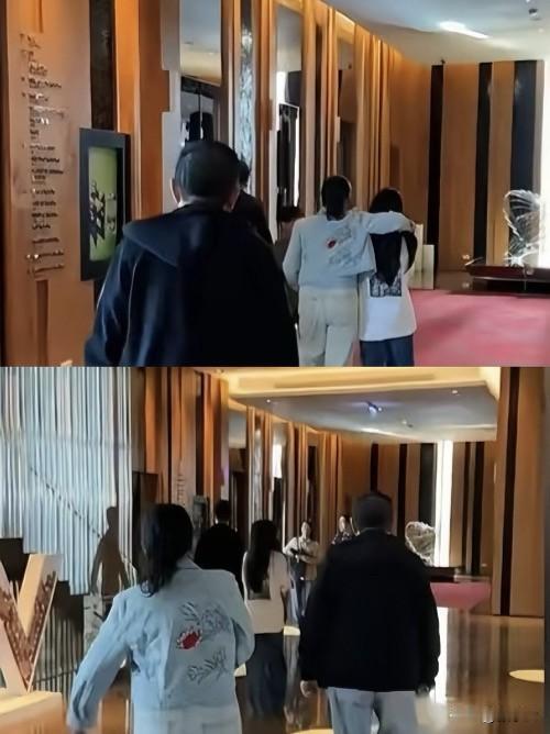 张兰的镜头里，一家五口齐齐整整走在酒店大堂。看见小孙子，张兰立马像个孩子一样小