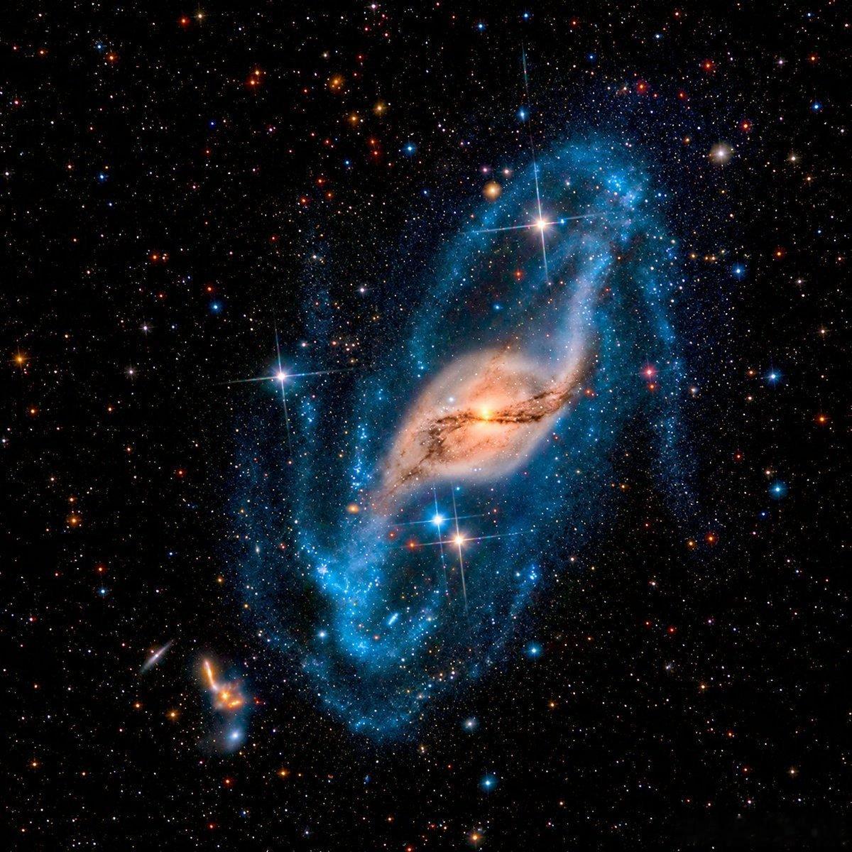 重力如何扭曲整个星系认识一下NGC3718（也称为Arp214），这是一