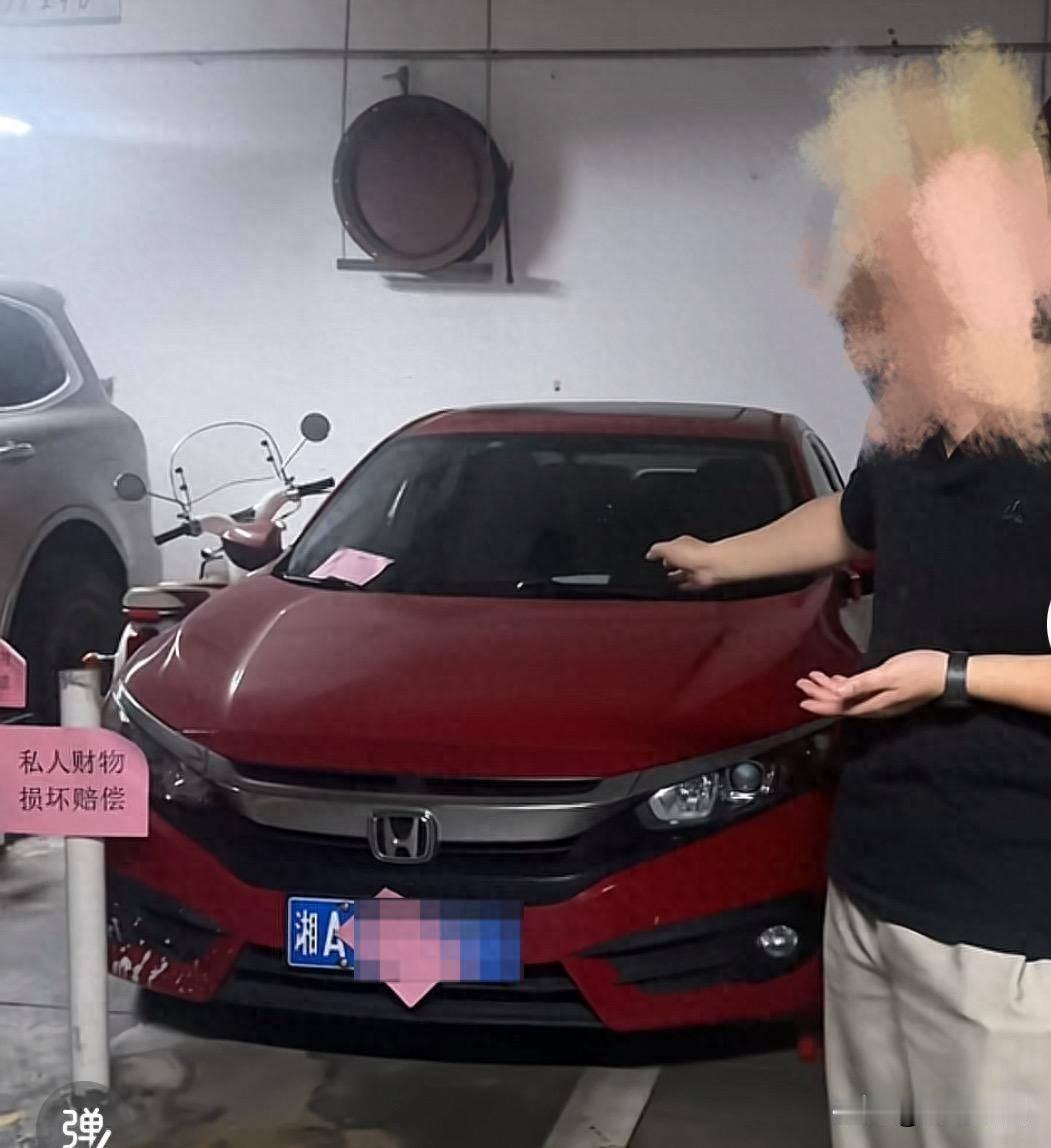 湖南长沙占别人车位的长沙市体育局彭慕曦这下子真惹到大麻烦了，连央媒都发声说"连车