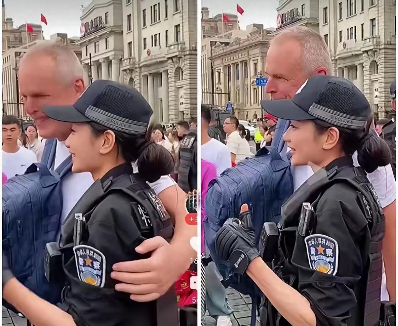 这个老外一点也不“入乡随俗“！拍照还是搂着“人民女警察”！是不是想拿照片回去