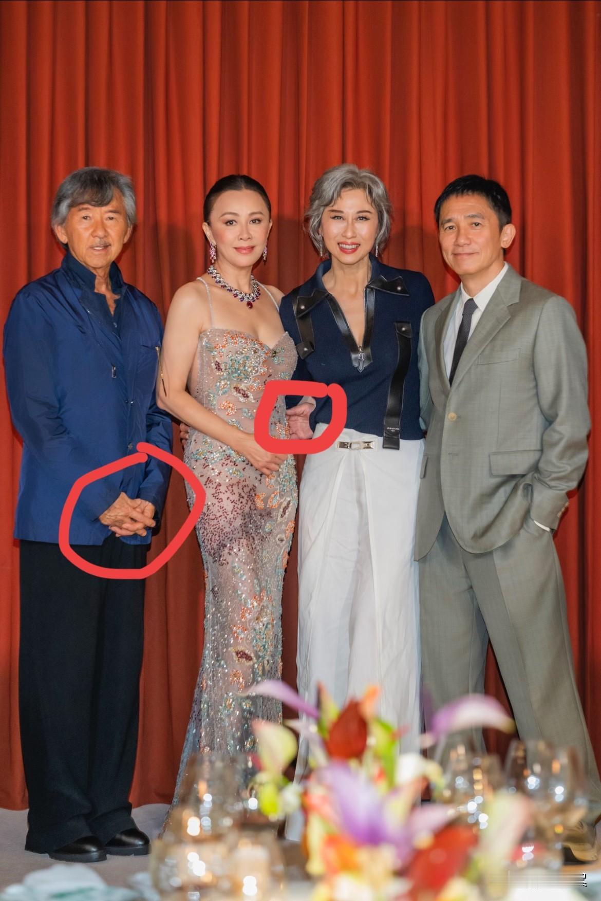 瞧，梁朝伟的手绕过叶倩文的腰，想要抓刘嘉玲的胳膊吗？倒是林子祥表现得中规中矩