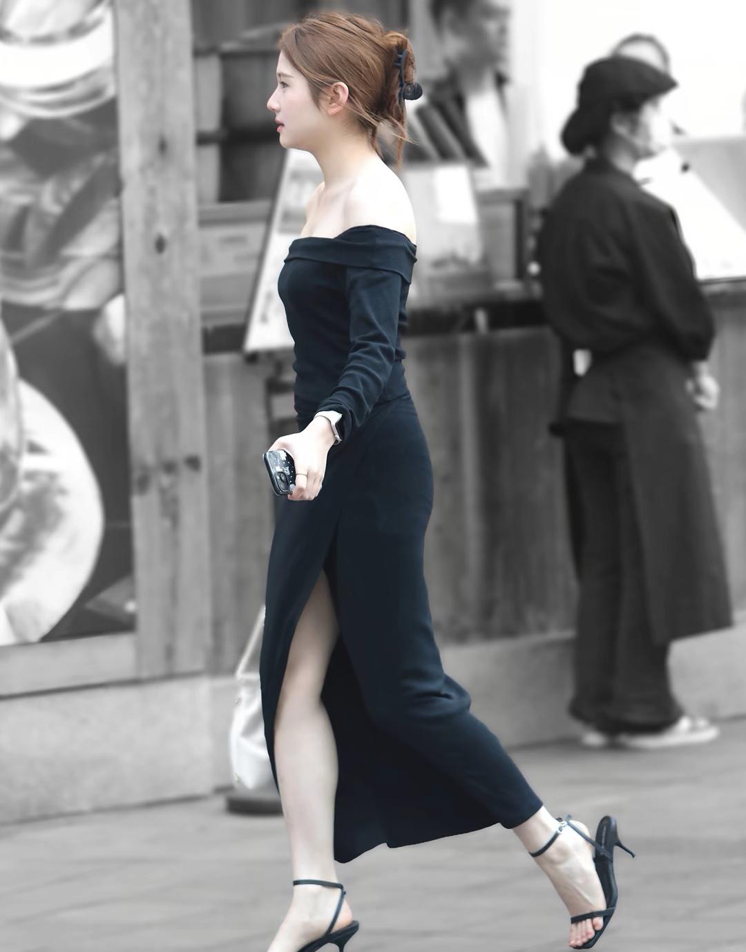 优雅漫步，时尚黑裙与高跟鞋的完美搭配