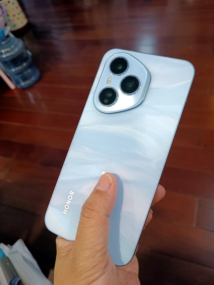 对不起了华为，让同事买了荣耀400Pro他本来想入手华为nova14Pro