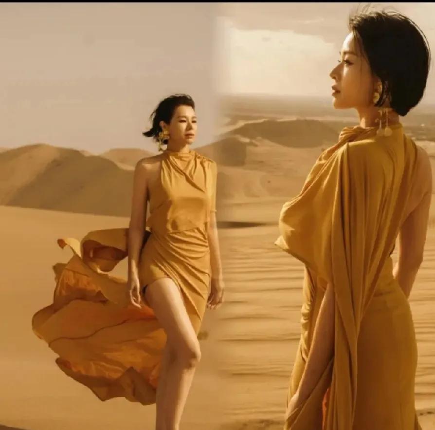 胡杏儿敦煌大片美炸！土黄高开叉裙勾勒曲线，沙漠氛围感拉满谁被胡杏儿新出的敦