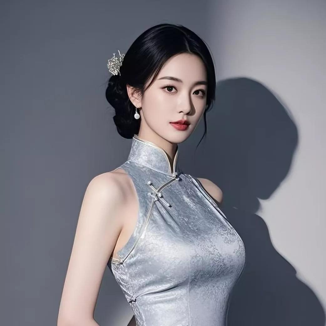 古典优雅的东方美人，银灰色旗袍韵味十足。颜色鲜艳的旗袍旗袍秋日大片黑金旗袍