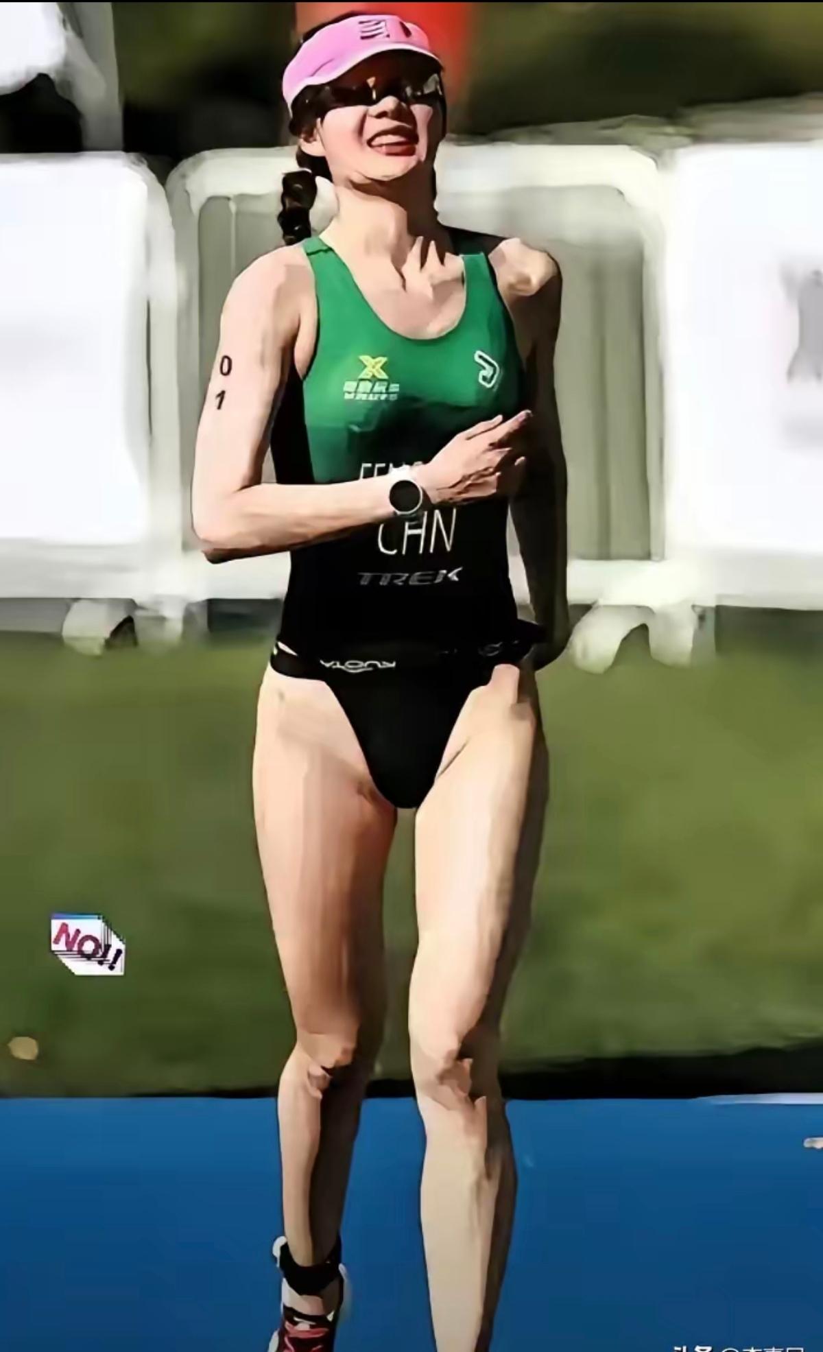 跑步中的女运动员，这种裤子的设计确实没有什么美感。