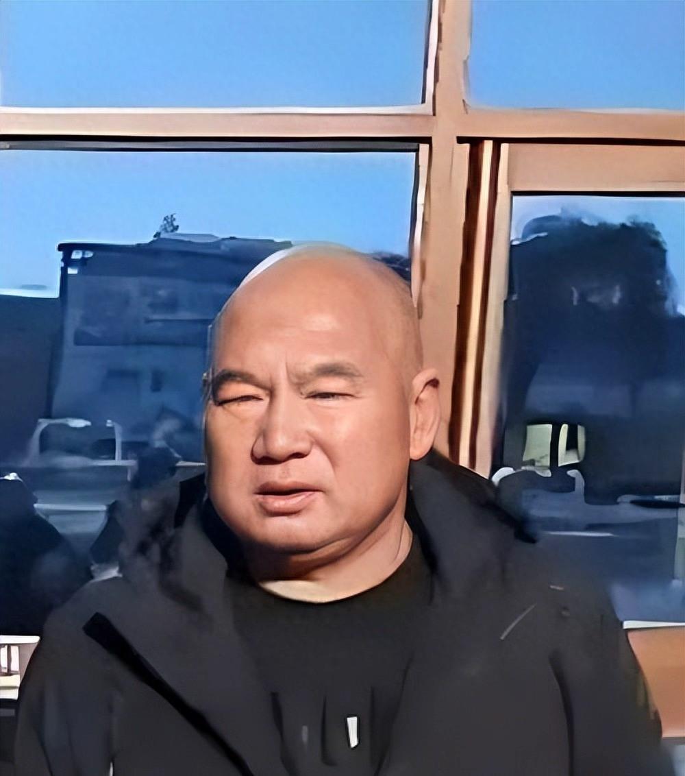 周永刚拿到了580万国家赔偿，创了纪录。但他说，这钱买不回21年青春，他还要追责