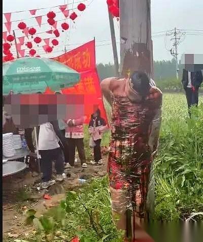 河南尉氏县一个新郎，大喜的日子，没进洞房，先被绑上了电线杆。头上扣着个猪八戒面