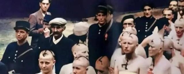 1945年，巴黎街头，几名漂亮的女子被剃光头发，剥光衣服，赤裸站在大街上，一群法
