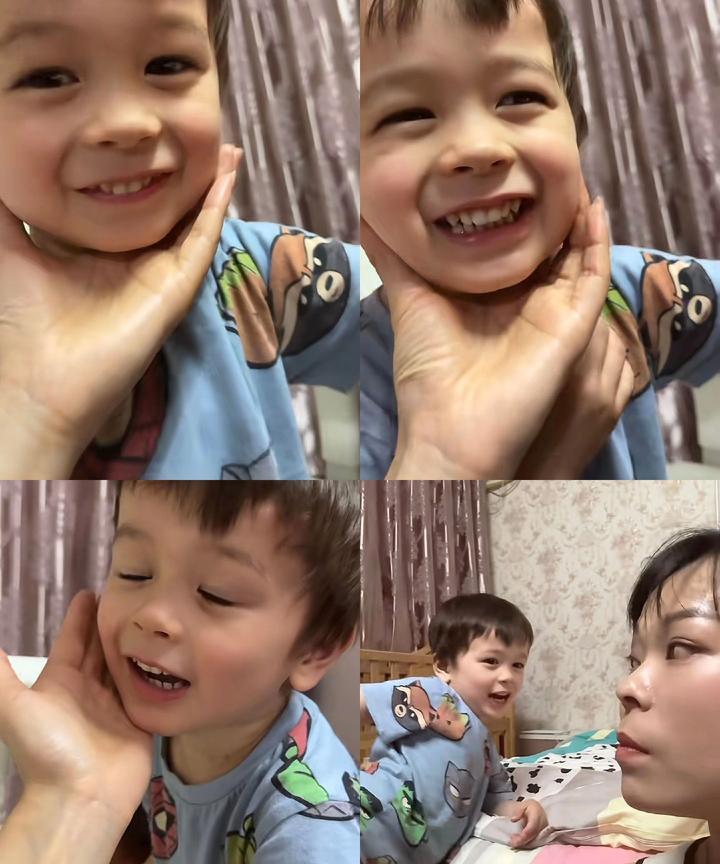 小凯文和姨妈互动，小虎牙配上软糯糯的中美混血肤质，笑起来又甜又可爱，小凯文想去姨
