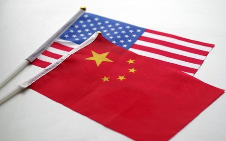 中美签了？稀土换停战，美国率先官宣，中国这回格外冷静 中美贸易战打得热火朝天