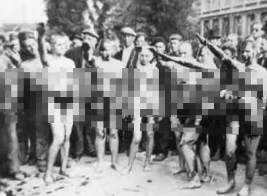 1945年，法国人伊娃，被人扒掉衣服，捆着双手双脚，在大街上迎接“法国人民”的愤