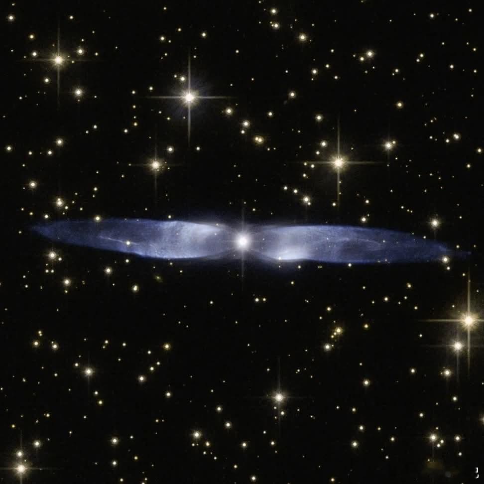 展开你的翅膀🪽在这片令人眼花缭乱的Hen2-437星云中心，一颗垂死的恒星