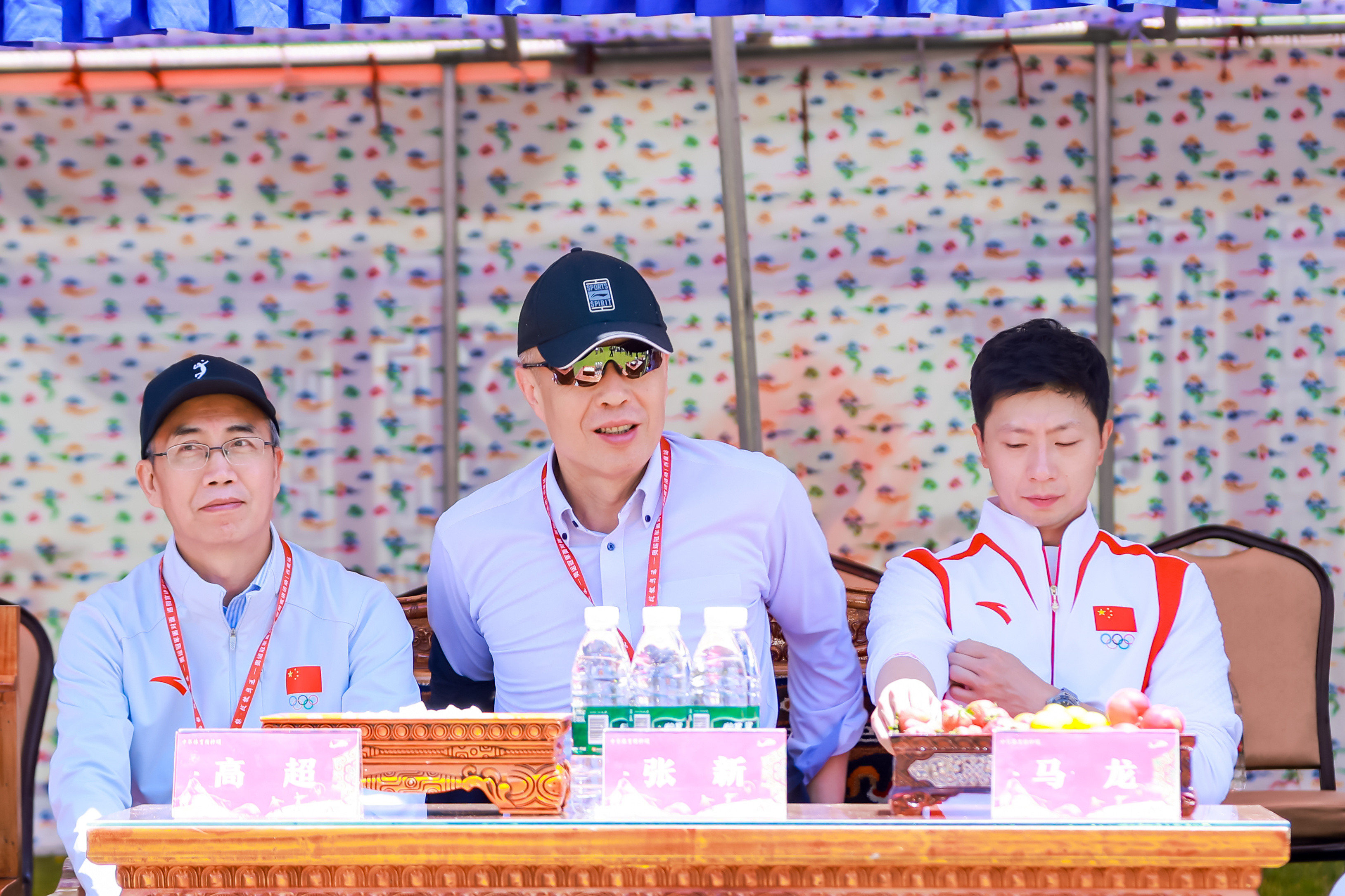 中华体育精神颂从左到右体总宣传司司长高超体总竞体司司长张新青联副主马龙