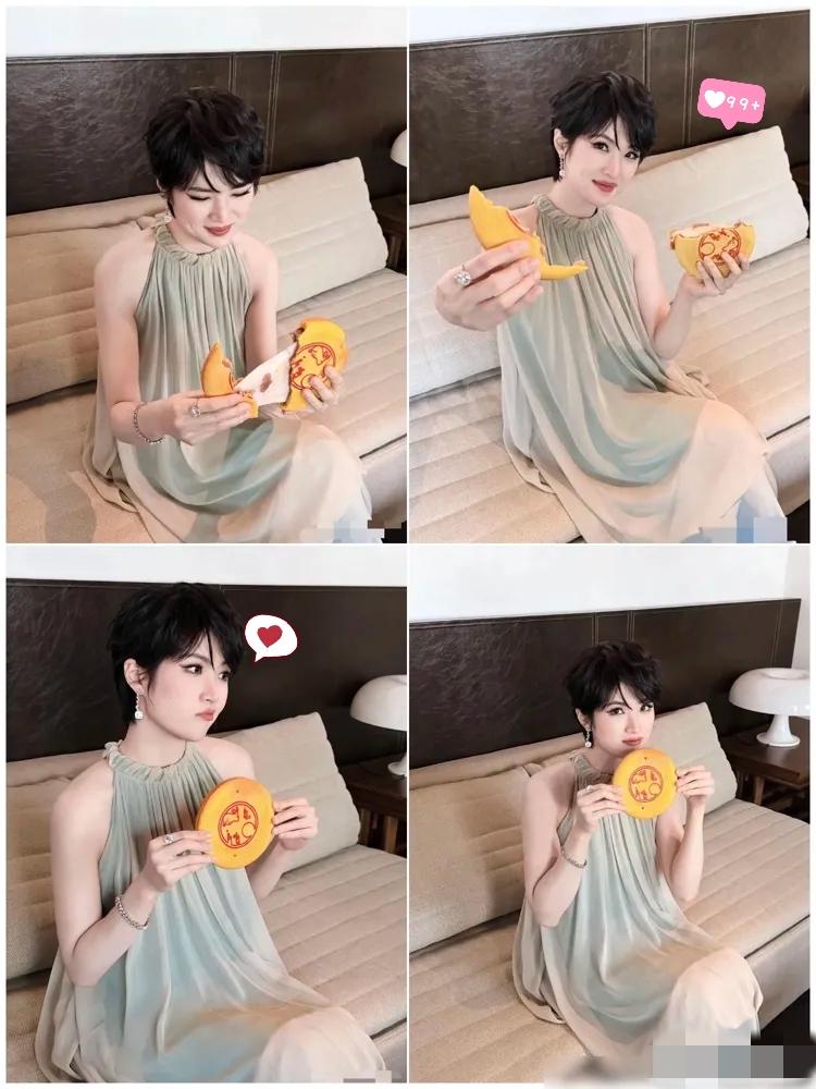 姚安娜中秋晒了张吃月饼的照片，镜头怼脸没滤镜，月饼咬了一半，身上那件白T特别扎眼