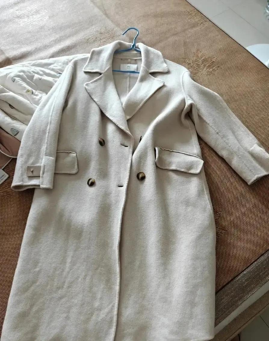 我上周手欠把八千块的羊绒大衣扔洗衣机里轻柔模式转了一圈拿出来直接缩成童装袖子短到