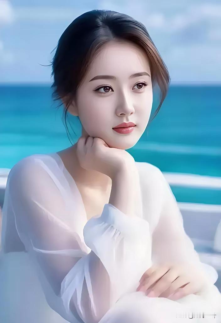 这位美女在海边思考人生。
