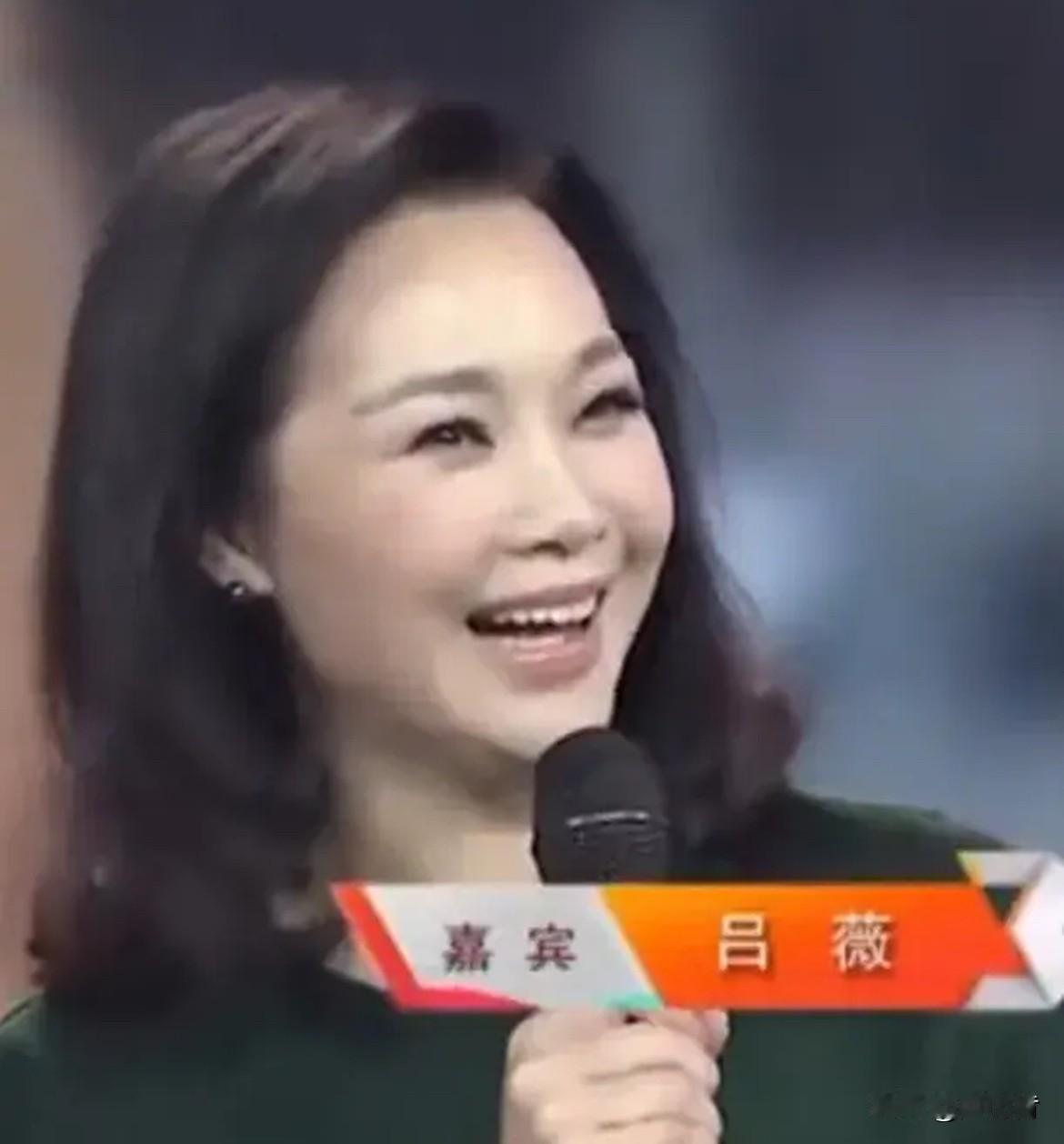 吕薇，1971生于杭州的一个越剧世家，女高音歌手，国家一级演员，海政文工团转业，
