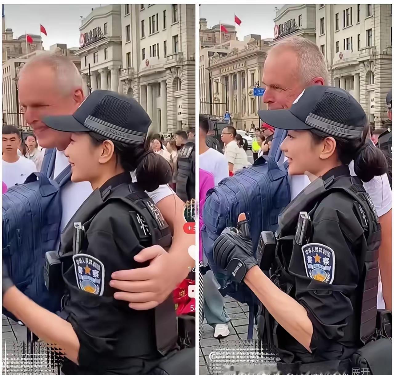 国庆外滩，一个老外想搭执勤女特警的肩膀合影，姑娘笑着把手一拨："Sorry，执勤