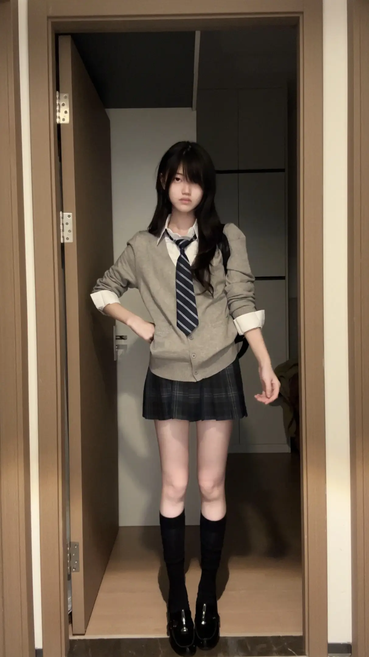 开衫还是背心。