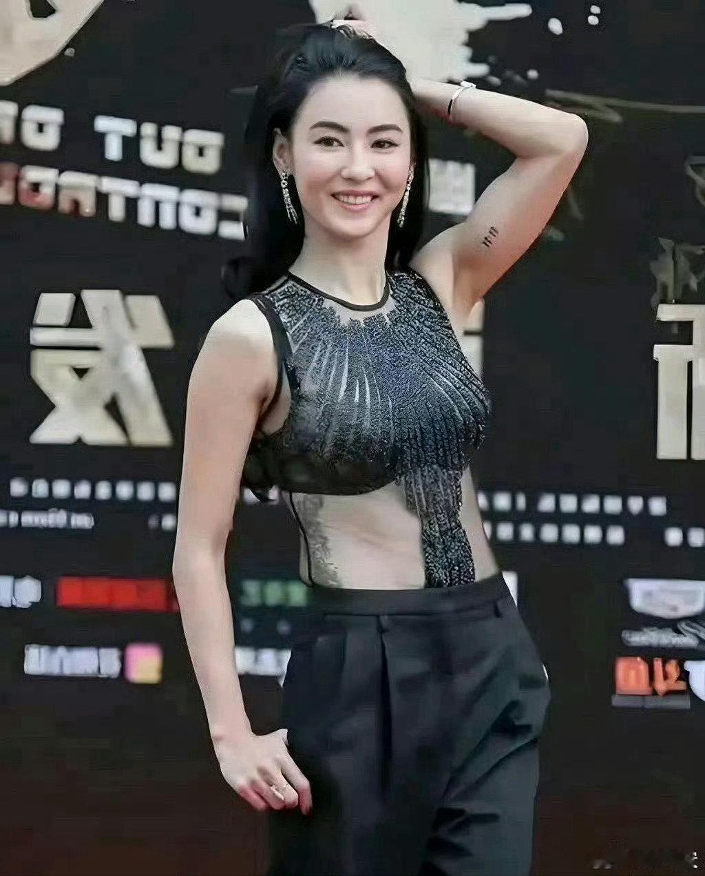 很好奇张柏芝的纹身是什么意思，有人懂吗？​​​