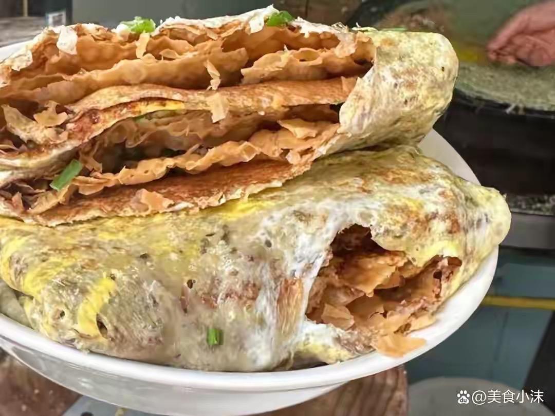 天津“10大早餐”，都是津味精华，你吃过几种1、煎饼果子2、锅巴菜3、大