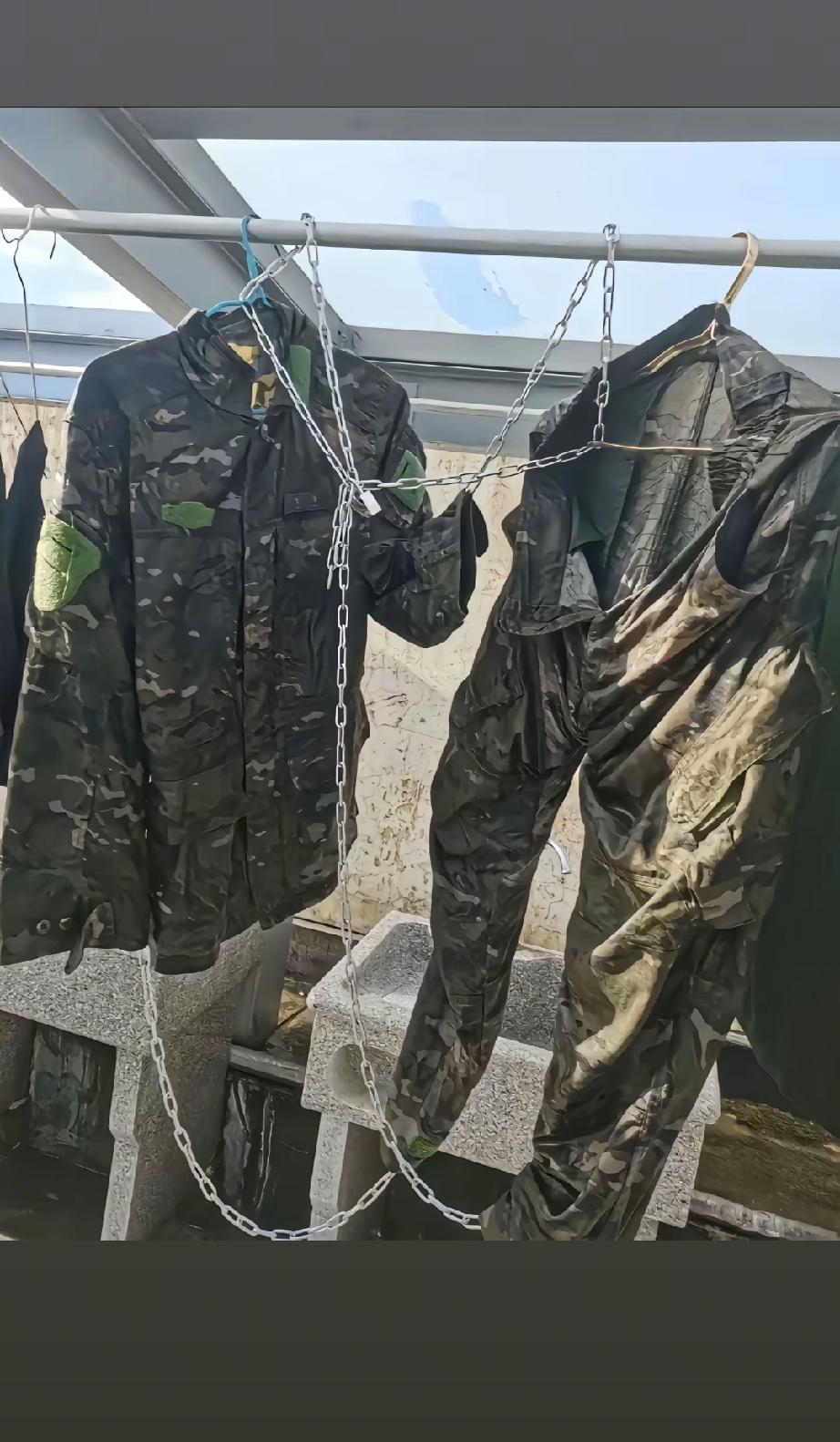 这衣服犯了什么罪，晾一下也要被五花大绑，铁链加身！