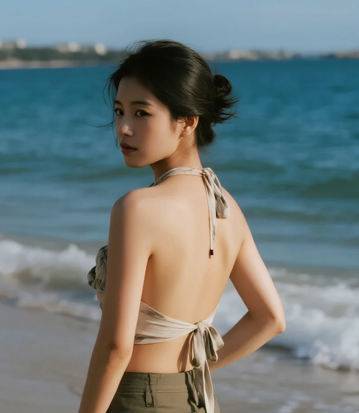 这海风，吹乱了她的发，也吹乱了我的心