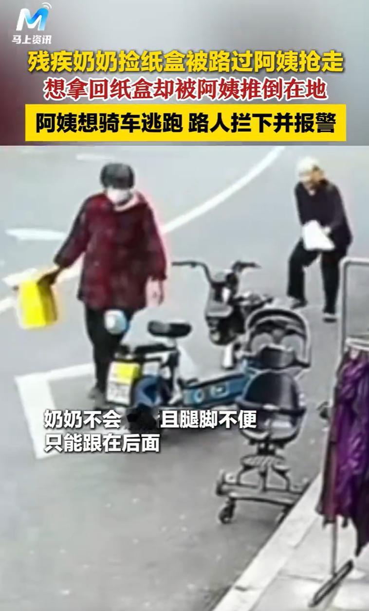 浙江温州，一五金店店主特意在门口给巷子里那位聋哑拾荒阿婆留着一叠废纸箱，阿婆刚搬