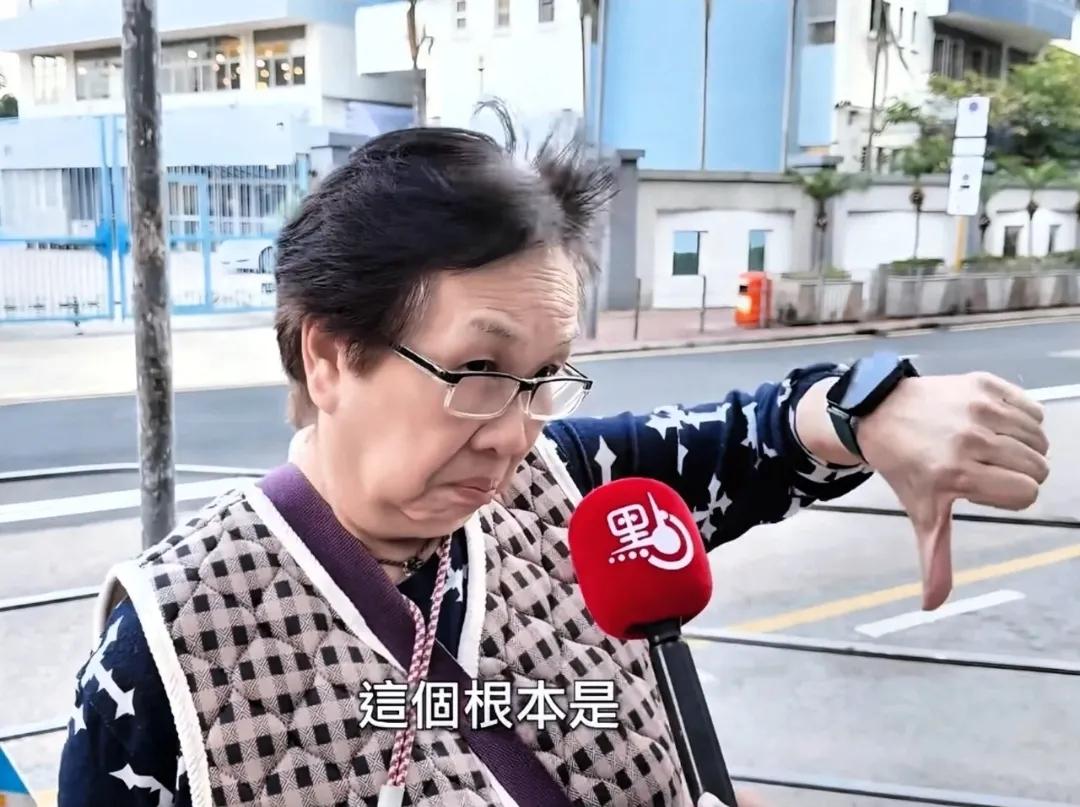 这就是所谓的“大隐隐于市”吧？香港街头那个买菜阿婆，几句话就把那些穿西装打领带的