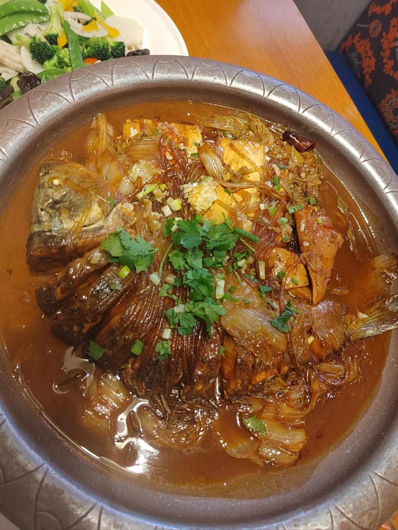 东北人爱吃的10道东北菜1熘肉段2得莫利炖大鱼3锅包肉4杀猪菜5熘