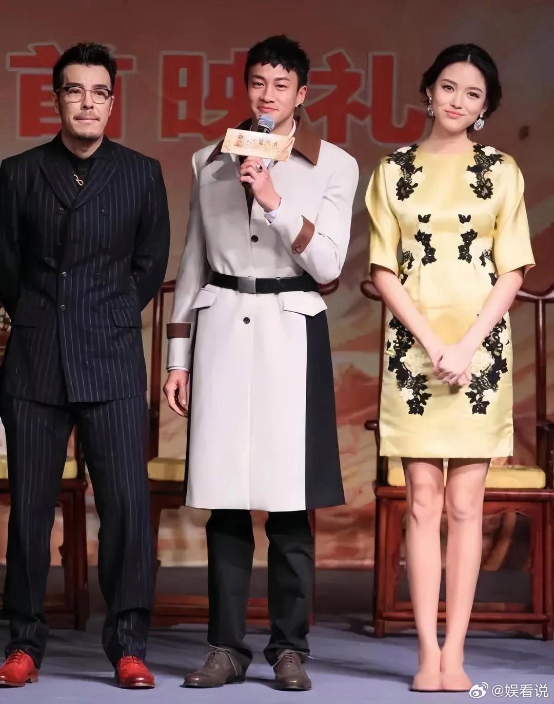 何润东个子已经还算高的，但是旁边的女士居然还跟他一样高。