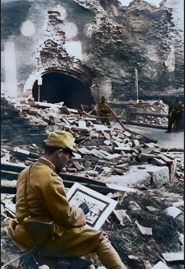 1938年6月，这张照片应该是拍摄于江浙沪地区，被日本人占领的某城镇。照片中，一