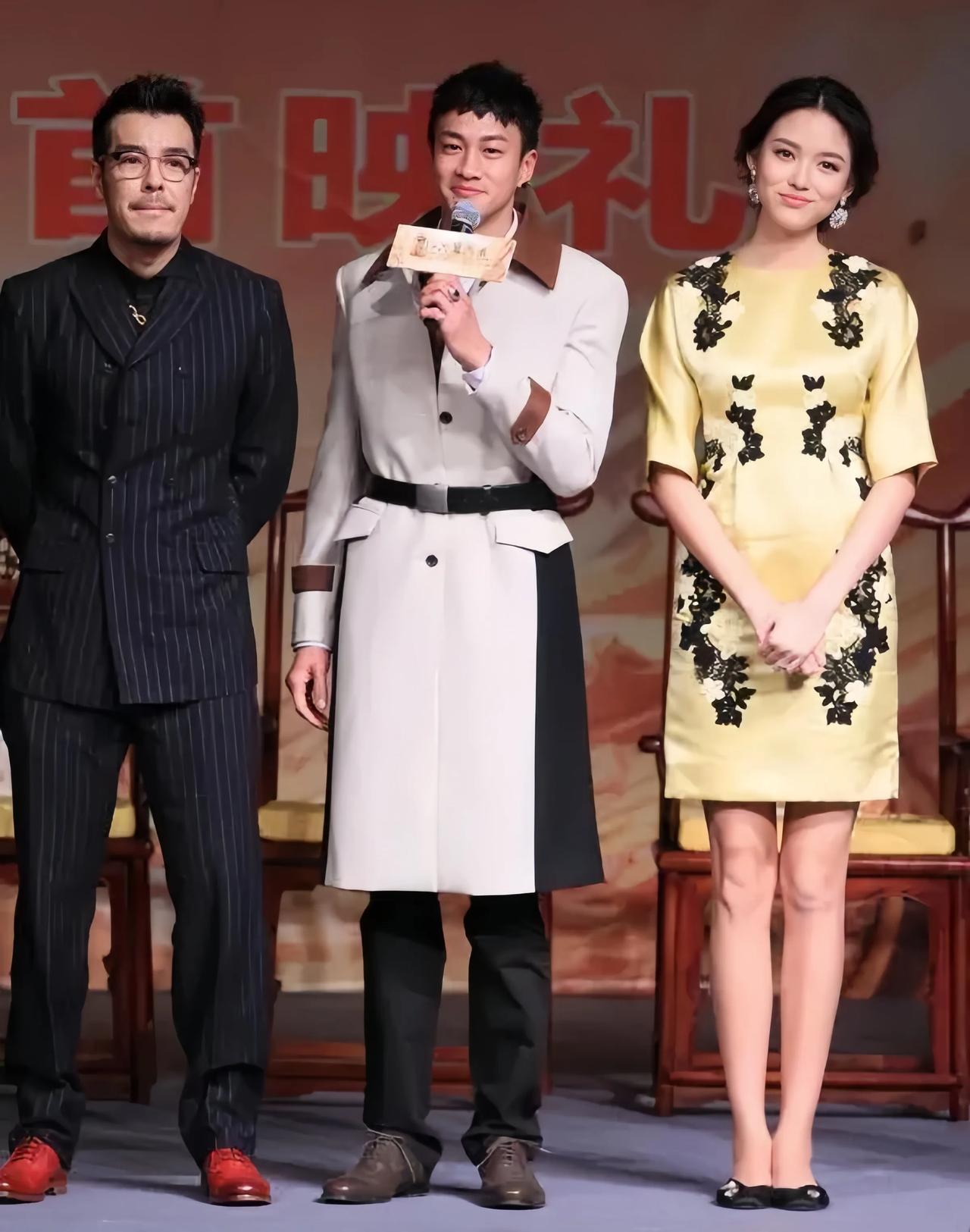 何润东个子已经还算高的，但是旁边的女士居然还跟他一样高。