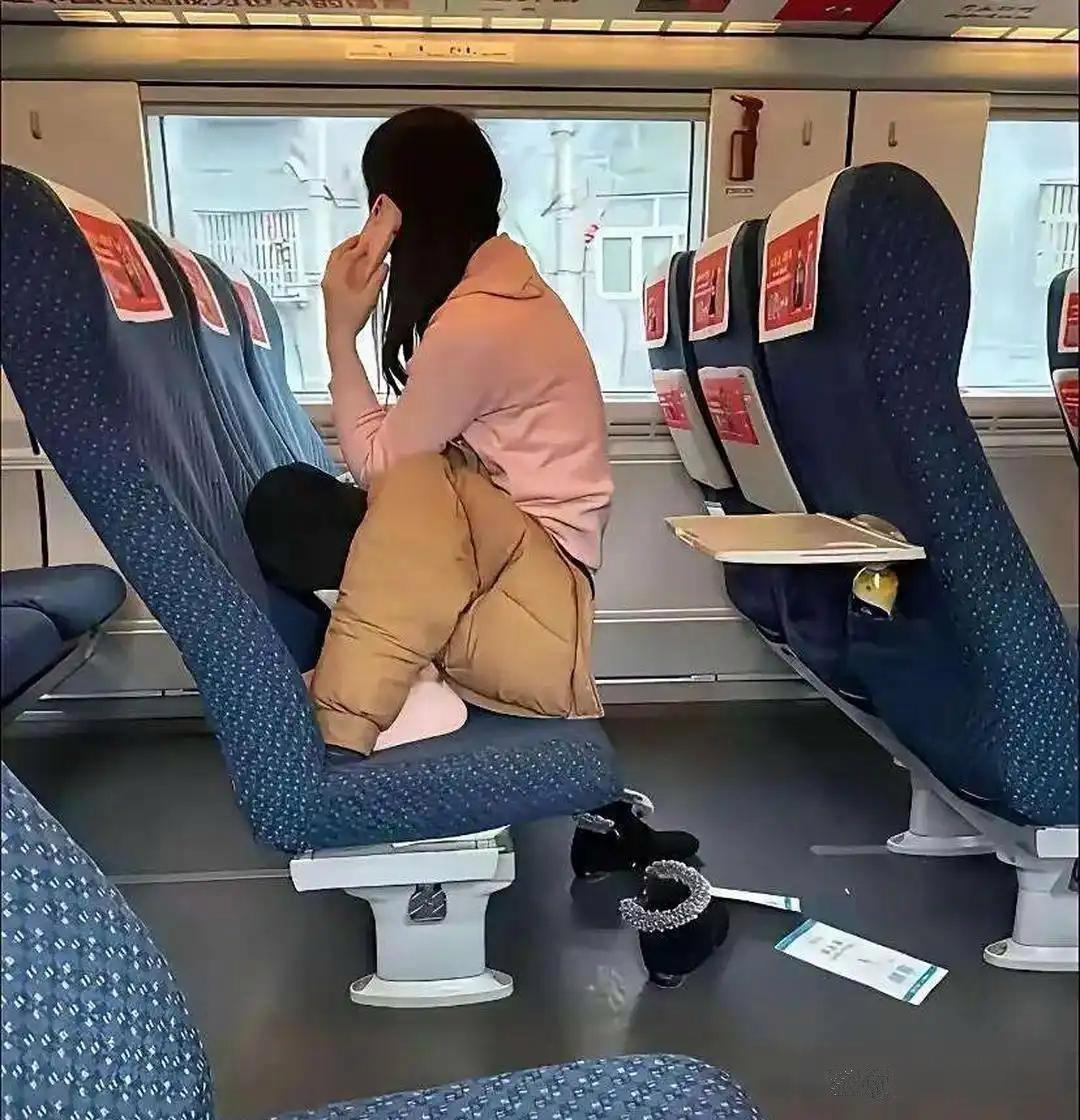 她说坐倒车晕车