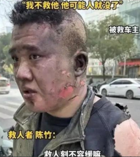 “我要不救他，他可能命就没了！”江苏一轿车突然自燃，司机被安全带锁住，而围观群众