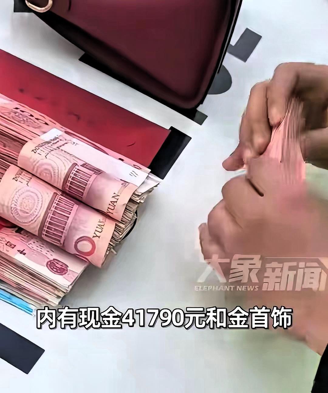 江西南昌，一女子在高速服务区上完厕所出来，余光瞥见，台边放着一个手提包。四下无人