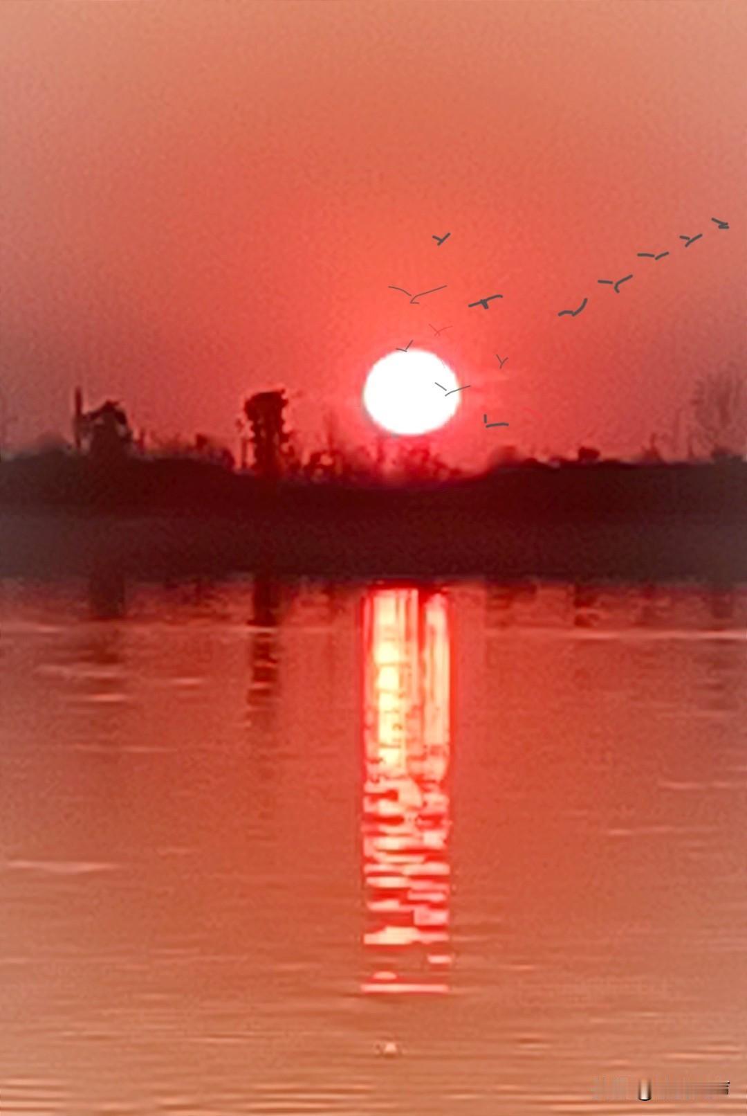 上联（对句）：半野红霞迎数雁，下联（出句）：一湾碧水抱孤舟。